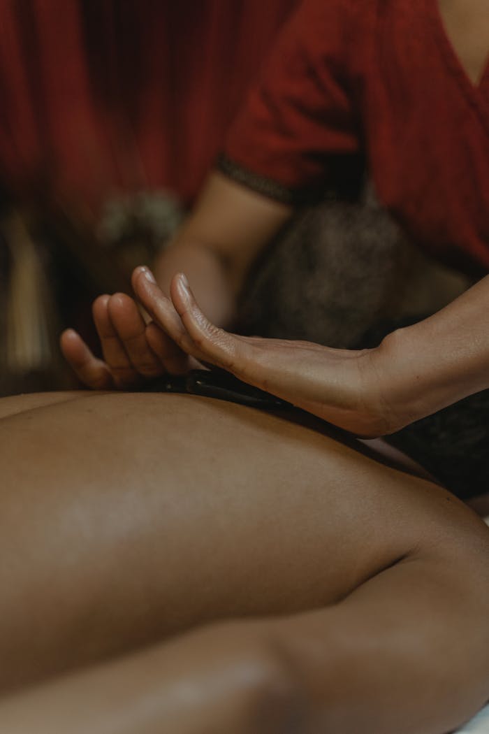 Experience therapeutic relaxation with a professional massage therapy session captured in a close-up view.